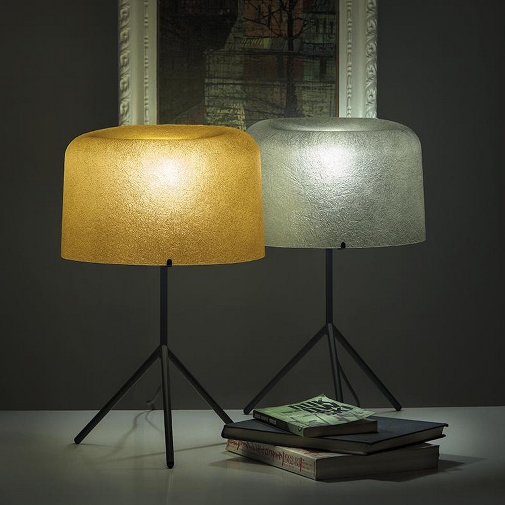 Le lampe de table OLA avec pied en doré et argenté